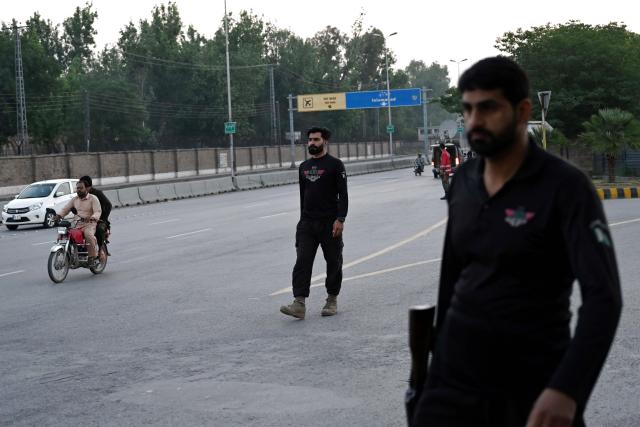 (250510) -- RAWALPINDI, May 10, 2025 (Xinhua) -- Security personnel patrol on a road leading to Nur Khan Air Base following Indian missile strike in Rawalpindi, Pakistan, May 10, 2025.
  India launched missile and drone strikes in multiple areas of Pakistan, including three airbases of the Pakistan Air Force (PAF), and also resorted to unprovoked firing along the international border in eastern Punjab province, Pakistani officials and sources confirmed in the wee hours of Saturday. (Xinhua/Ahmad Kamal)