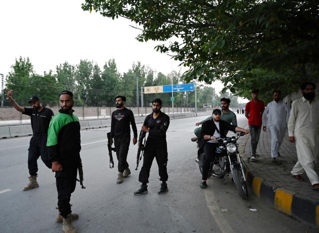 (250510) -- RAWALPINDI, May 10, 2025 (Xinhua) -- Security personnel patrol on a road leading to Nur Khan Air Base following Indian missile strike in Rawalpindi, Pakistan, May 10, 2025.
  India launched missile and drone strikes in multiple areas of Pakistan, including three airbases of the Pakistan Air Force (PAF), and also resorted to unprovoked firing along the international border in eastern Punjab province, Pakistani officials and sources confirmed in the wee hours of Saturday. (Xinhua/Ahmad Kamal)