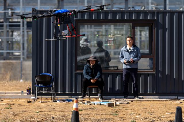 (250510) -- SHENYANG, May 10, 2025 (Xinhua) -- A trainee takes a practical drone training session at an enterprise in Shenbei New District, in Shenyang, northeast China's Liaoning Province, April 25, 2025.
  As an important driving force of new economic momentum, the low-altitude economy is viewed by many as a key strategic emerging industry.
   In recent years, Liaoning Province has seized opportunities to actively develop its low-altitude economy. Taking full advantage of its location and its strengths in the fields of aviation and aerospace, the province has focused its development of the low-altitude economy on the general aviation and drone sectors, and enriched application scenarios such as emergency rescue, sightseeing tourism, and agricultural and forestry protection.
   A development pattern featuring Shenyang and Dalian as key forces supporting Liaoning's low-altitude economy is taking shape, ranging from China's home-grown four-seat electric aircraft RX4E, independently developed by the Liaoning General Aviation Academy of Shenyang Aerospace University, securing the first type certificate, to a drone powered by an ultra-low-temperature high-energy-density lithium battery, developed by the Dalian Institute of Chemical Physics under the Chinese Academy of Sciences, completing a flight test under extreme cold conditions. 
   The Shenyang general aviation industry base has attracted a cluster of enterprises, and multiple low-altitude passenger routes have been launched in Dalian. The low-altitude economy has injected impetus into the high-quality development of Liaoning Province. (Xinhua/Chu Jiayin)