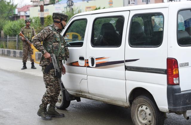 (250510) -- SRINAGAR, May 10, 2025 (Xinhua) -- Indian paramilitary troopers stop a car at a checkpoint as security beefed up in Srinagar city, the summer capital of Indian-controlled Kashmir, May 10, 2025. (Xinhua/Javed Dar)