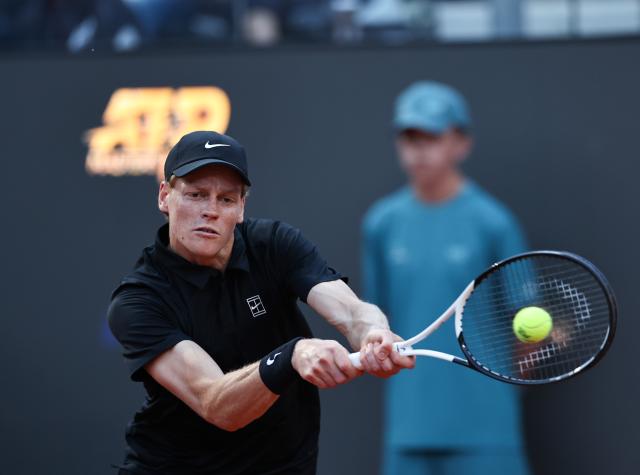 (250511) -- ROME, May 11, 2025 (Xinhua) -- Jannik Sinner returns a shot during the men's singles round of 64 match between Jannik Sinner of Italy and Mariano Navone of Argentina at the ATP Italian Open in Rome, Italy, May 10, 2025. (Xinhua/Li Jing)