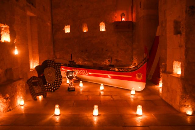 (250511) -- BIRGU, May 11, 2025 (Xinhua) -- This photo taken on May 10, 2025 shows exhibits of a museum illuminated with light of candles in Birgu, Malta, on May 10, 2025. Heritage Malta, in collaboration with the Birgu Local Council, on Saturday hosted the "Museums by Candlelight" event. (Photo by Jonathan Borg/Xinhua)