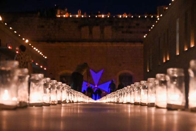 (250511) -- BIRGU, May 11, 2025 (Xinhua) -- People visit a museum illuminated with light of candles in Birgu, Malta, on May 10, 2025. Heritage Malta, in collaboration with the Birgu Local Council, on Saturday hosted the "Museums by Candlelight" event. (Photo by Jonathan Borg/Xinhua)