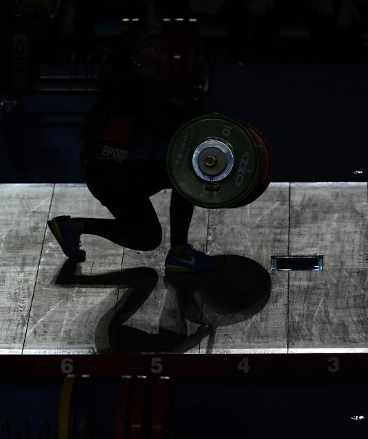 (250511) -- JIANGSHAN, May 11, 2025 (Xinhua) -- Mai Almadani of the United Arab Emirates (UAE) competes during the women's 59kg competition at 2025 Asian Weightlifting Championships in Jiangshan, east China's Zhejiang Province, May 11, 2025. (Xinhua/Hou Zhaokang)