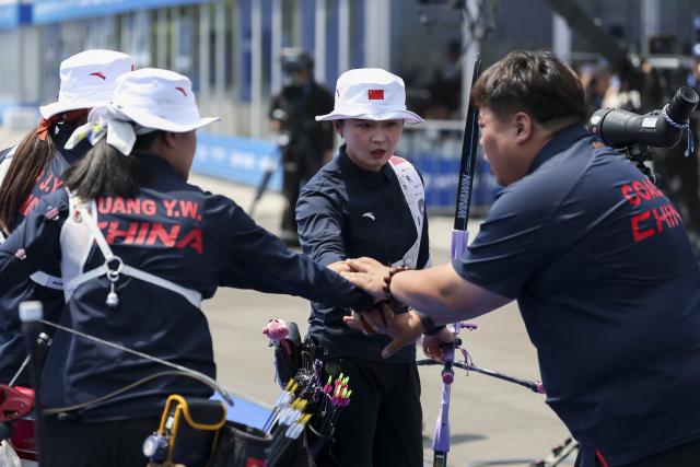(250511) -- SHANGHAI, May 11, 2025 (Xinhua) -- Members of team China cheer up during the gold final of the Recurve Women's Team competition at Shanghai 2025 Archery World Cup Stage 2 in Shanghai, east China, May 11, 2025. (Xinhua/Wang Xiang)
