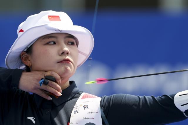 (250511) -- SHANGHAI, May 11, 2025 (Xinhua) -- Li Jiaman of China competes during the gold final of the Recurve Women's Team competition at Shanghai 2025 Archery World Cup Stage 2 in Shanghai, east China, May 11, 2025. (Xinhua/Wang Xiang)