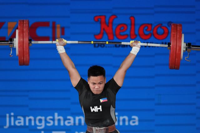 (250511) -- JIANGSHAN, May 11, 2025 (Xinhua) -- Elreen Ann Ando of the Philippines competes during the women's 64kg competition at 2025 Asian Weightlifting Championships in Jiangshan, east China's Zhejiang Province, May 11, 2025. (Xinhua/Hou Zhaokang)
