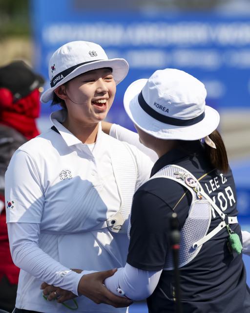 (250511) -- SHANGHAI, May 11, 2025 (Xinhua) -- Lim Sihyeon (L) of South Korea greets compatriot Lee Gahyun after the gold final of the Recurve Women's competition at Shanghai 2025 Archery World Cup Stage 2 in Shanghai, east China, May 11, 2025. (Xinhua/Wang Xiang)