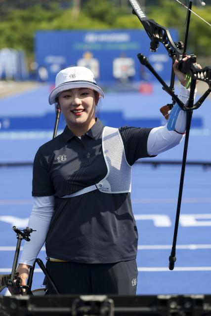 (250511) -- SHANGHAI, May 11, 2025 (Xinhua) -- Lee Gahyun of South Korea celebrates after winning the gold final of the Recurve Women's competition at Shanghai 2025 Archery World Cup Stage 2 in Shanghai, east China, May 11, 2025. (Xinhua/Wang Xiang)