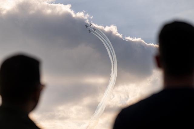 (250511) -- VELIKA GORICA, May 11, 2025 (Xinhua) -- Spectators watch as the Croatian Air Force's aerobatic display team, Wings of Storm, performs during the AIRVG 2025 air show in Velika Gorica, Croatia on May 11, 2025. (Davor Puklavec/PIXSELL via Xinhua)
