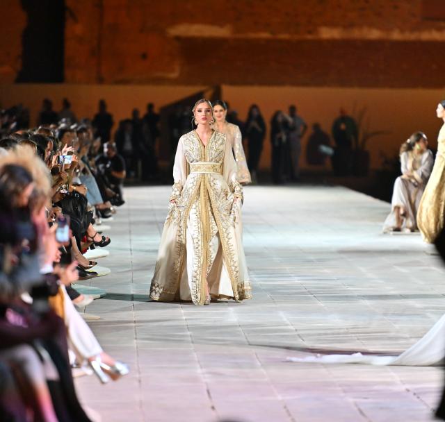 (250511) -- MARRAKECH, May 11, 2025 (Xinhua) -- Models present creations during a caftan fashion show in Marrakech, Morocco, May 10, 2025. The fashion show was held here from May 8 to May 11 to promote caftan, a traditional dress mostly worn by Moroccan women for special occasion. (Photo by Saouri Aissa/Xinhua)