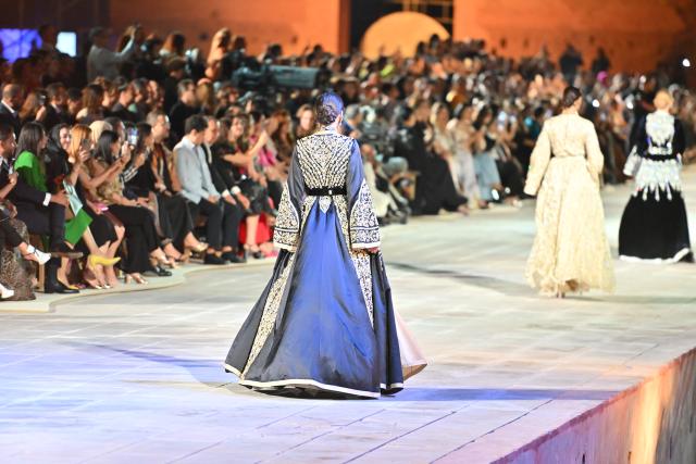 (250511) -- MARRAKECH, May 11, 2025 (Xinhua) -- Models present creations during a caftan fashion show in Marrakech, Morocco, May 10, 2025. The fashion show was held here from May 8 to May 11 to promote caftan, a traditional dress mostly worn by Moroccan women for special occasion. (Photo by Saouri Aissa/Xinhua)