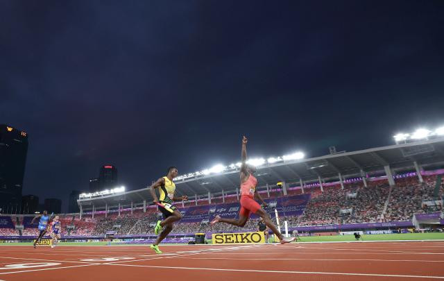 (250511) -- GUANGZHOU, May 11, 2025 (Xinhua) -- Eliezer Adjibi (1st R) of team Canada crosses the finish line during the mixed 4x100m relay final at the World Athletics Relays Guangzhou 2025 in Guangzhou, south China's Guangdong Province, May 11, 2025. (Xinhua/Li Ming)