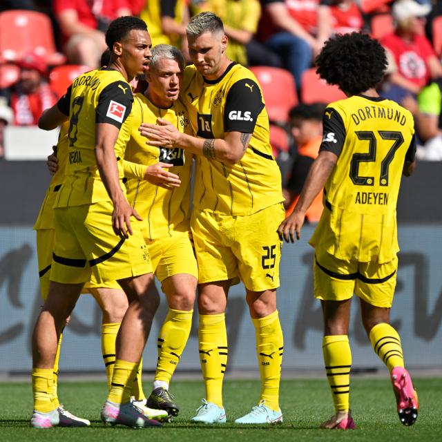 (250512) -- LEVERKUSEN, May 12, 2025 (Xinhua) -- Julian Ryerson (2nd L) of Borussia Dortmund celebrates scoring with his teammates during the first division of Bundesliga football match between Bayer 04 Leverkusen and Borussia Dortmund in Leverkusen, Germany, May 11, 2025. (Photo by Ulrich Hufnagel/Xinhua)