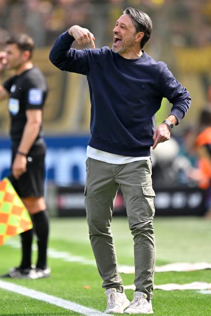 (250512) -- LEVERKUSEN, May 12, 2025 (Xinhua) -- Niko Kovac, head coach of Borussia Dortmund, instructs during the first division of Bundesliga football match between Bayer 04 Leverkusen and Borussia Dortmund in Leverkusen, Germany, May 11, 2025. (Photo by Ulrich Hufnagel/Xinhua)