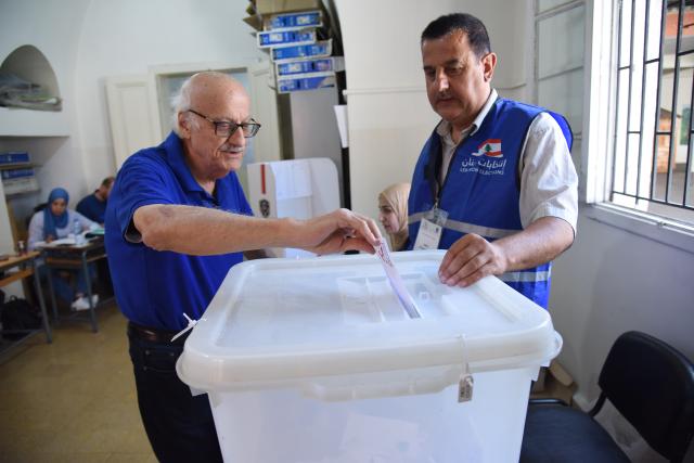 (250512) -- TRIPOLI, May 12, 2025 (Xinhua) -- A man casts his ballot at a polling station in Tripoli, Lebanon, on May 11, 2025.
  The second round of Lebanon's municipal and local elections began on Sunday in the governorates of Akkar and North Lebanon, following the first round held on May 4 in the Mount Lebanon Governorate.
  According to the state-run National News Agency, 3,569 candidates submitted nominations for 134 municipal and 210 local positions in Akkar. Meanwhile, 3,569 candidates submitted nominations for 153 municipal and 462 local positions in North Lebanon, according to unofficial statistical reports. (Photo by Khaled Habashiti/Xinhua)