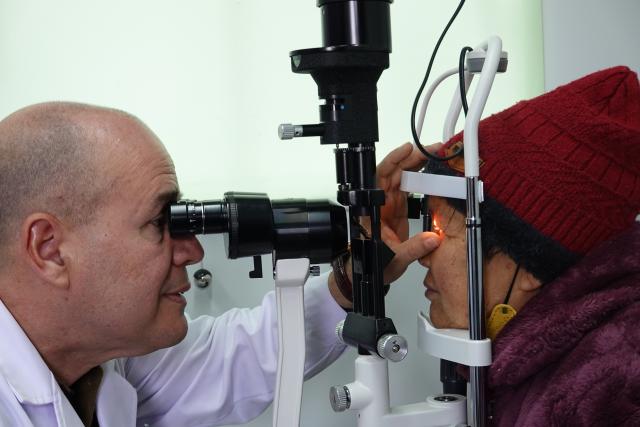 (250512) -- HEFEI, May 12, 2025 (Xinhua) -- Pedro Castro (L) provides free clinical service to a local resident at a health center of Changfeng County in Hefei, east China's Anhui Province, March 6, 2025. (Xinhua/Zhao Jinzheng)