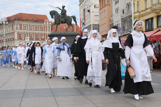 (250512) -- ZAGREB, May 12, 2025 (Xinhua) -- A parade of Croatian nurses in historical uniforms is held to mark International Nurses Day in Zagreb, Croatia, May 12, 2025. (Patrik Macek/PIXSELL via Xinhua)