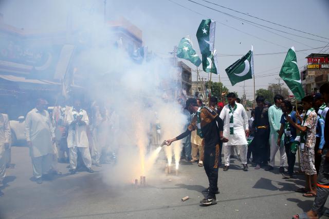 (250512) -- MULTAN, May 12, 2025 (Xinhua) -- Pakistani people celebrate after the ceasefire between Pakistan and India, in Multan, Pakistan on May 12, 2025. As a tense ceasefire between nuclear-armed neighbors Pakistan and India holds after weeks of hostilities, residents of the Pakistani capital are expressing both relief and resilience, grateful that escalation was avoided, yet proud of their country's measured military response.
TO GO WITH "Feature: Pakistanis voice relief, resilience as Indo-Pak ceasefire holds" (Photo by Mansoor Abbas/Xinhua)