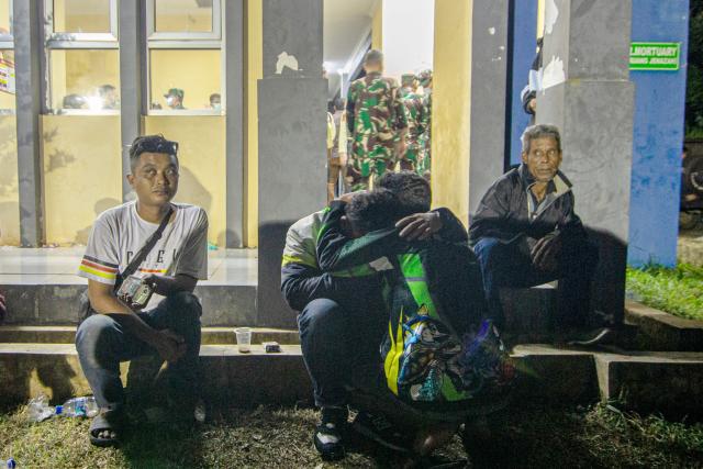 (250512) -- GARUT, May 12, 2025 (Xinhua) -- Relatives of the victims of ammunition disposal blast wait for information at a hospital in Garut Regency, West Java Province, Indonesia, May 12, 2025. At least 13 people were killed when the Indonesian army destroyed expired ammunition in West Java province on Monday, a military officer said. (Photo by Claudio/Xinhua)
