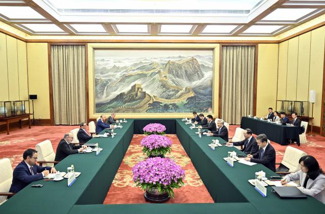 (250512) -- BEIJING, May 12, 2025 (Xinhua) -- Li Xi, a member of the Standing Committee of the Political Bureau of the Communist Party of China (CPC) Central Committee and secretary of the CPC Central Commission for Discipline Inspection, meets with Cuban Minister of Foreign Affairs Bruno Rodriguez Parrilla, who is here to attend the fourth ministerial meeting of the China-CELAC (Community of Latin American and Caribbean States) Forum, in Beijing, capital of China, May 12, 2025. (Xinhua/Yin Bogu)
