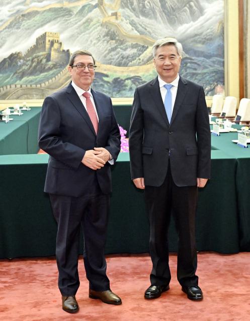 (250512) -- BEIJING, May 12, 2025 (Xinhua) -- Li Xi, a member of the Standing Committee of the Political Bureau of the Communist Party of China (CPC) Central Committee and secretary of the CPC Central Commission for Discipline Inspection, meets with Cuban Minister of Foreign Affairs Bruno Rodriguez Parrilla, who is here to attend the fourth ministerial meeting of the China-CELAC (Community of Latin American and Caribbean States) Forum, in Beijing, capital of China, May 12, 2025. (Xinhua/Yin Bogu)
