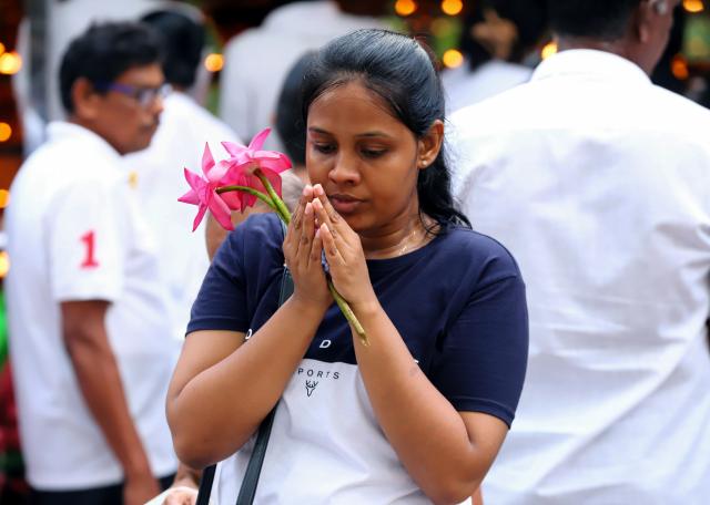 (250512) -- COLOMBO, May 12, 2025 (Xinhua) -- A woman participates in a celebration of Vesak Day in Colombo, Sri Lanka, on May 12, 2025. (Photo by Ajith Perera/Xinhua)
