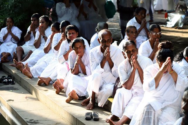 (250512) -- COLOMBO, May 12, 2025 (Xinhua) -- People participate in a celebration of Vesak Day in Colombo, Sri Lanka, on May 12, 2025. (Photo by Ajith Perera/Xinhua)