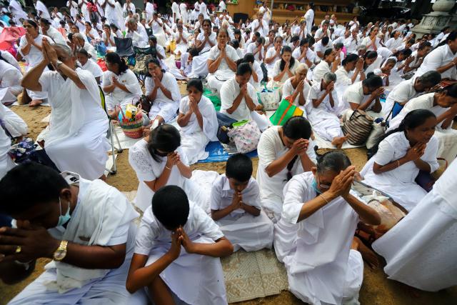 (250512) -- COLOMBO, May 12, 2025 (Xinhua) -- People participate in a celebration of Vesak Day in Colombo, Sri Lanka, on May 12, 2025. (Photo by Ajith Perera/Xinhua)