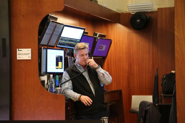 (250512) -- NEW YORK, May 12, 2025 (Xinhua) -- A trader talks on a phone on the floor of the New York Stock Exchange in New York, the United States, on May 12, 2025. U.S. stocks rallied sharply on Monday after the United States and China announced a temporary rollback of reciprocal tariffs, providing much-needed relief to investors concerned about the escalating trade war's economic fallout. The Dow Jones Industrial Average rose 1,160.72 points, or 2.81 percent, to 42,410.1. The S&P 500 added 184.28 points, or 3.26 percent, to 5,844.19. The Nasdaq Composite Index increased 779.43 points, or 4.35 percent, to 18,708.34. (Xinhua/Liu Yanan)