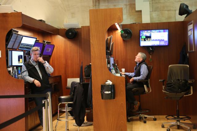 (250512) -- NEW YORK, May 12, 2025 (Xinhua) -- Traders work on the floor of the New York Stock Exchange in New York, the United States, on May 12, 2025. U.S. stocks rallied sharply on Monday after the United States and China announced a temporary rollback of reciprocal tariffs, providing much-needed relief to investors concerned about the escalating trade war's economic fallout. The Dow Jones Industrial Average rose 1,160.72 points, or 2.81 percent, to 42,410.1. The S&P 500 added 184.28 points, or 3.26 percent, to 5,844.19. The Nasdaq Composite Index increased 779.43 points, or 4.35 percent, to 18,708.34. (Xinhua/Liu Yanan)