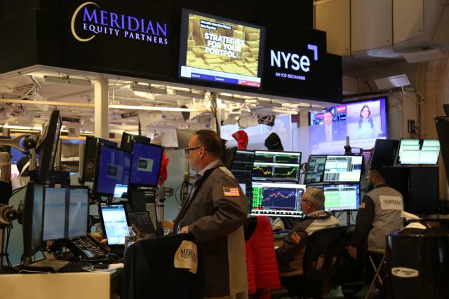 (250512) -- NEW YORK, May 12, 2025 (Xinhua) -- Traders work on the floor of the New York Stock Exchange in New York, the United States, on May 12, 2025. U.S. stocks rallied sharply on Monday after the United States and China announced a temporary rollback of reciprocal tariffs, providing much-needed relief to investors concerned about the escalating trade war's economic fallout. The Dow Jones Industrial Average rose 1,160.72 points, or 2.81 percent, to 42,410.1. The S&P 500 added 184.28 points, or 3.26 percent, to 5,844.19. The Nasdaq Composite Index increased 779.43 points, or 4.35 percent, to 18,708.34. (Xinhua/Liu Yanan)