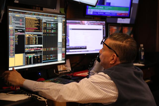 (250512) -- NEW YORK, May 12, 2025 (Xinhua) -- A trader works on the floor of the New York Stock Exchange in New York, the United States, on May 12, 2025. U.S. stocks rallied sharply on Monday after the United States and China announced a temporary rollback of reciprocal tariffs, providing much-needed relief to investors concerned about the escalating trade war's economic fallout. The Dow Jones Industrial Average rose 1,160.72 points, or 2.81 percent, to 42,410.1. The S&P 500 added 184.28 points, or 3.26 percent, to 5,844.19. The Nasdaq Composite Index increased 779.43 points, or 4.35 percent, to 18,708.34. (Xinhua/Liu Yanan)