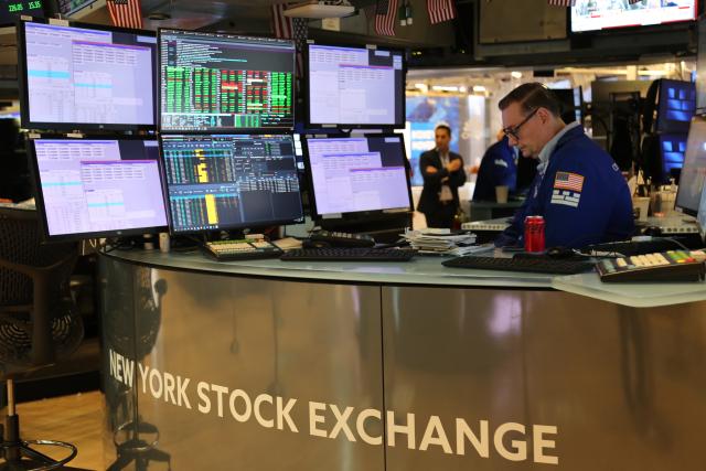 (250512) -- NEW YORK, May 12, 2025 (Xinhua) -- Traders work on the floor of the New York Stock Exchange in New York, the United States, on May 12, 2025. U.S. stocks rallied sharply on Monday after the United States and China announced a temporary rollback of reciprocal tariffs, providing much-needed relief to investors concerned about the escalating trade war's economic fallout. The Dow Jones Industrial Average rose 1,160.72 points, or 2.81 percent, to 42,410.1. The S&P 500 added 184.28 points, or 3.26 percent, to 5,844.19. The Nasdaq Composite Index increased 779.43 points, or 4.35 percent, to 18,708.34. (Xinhua/Liu Yanan)