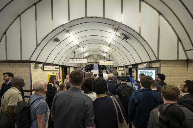 (250512) -- LONDON, May 12, 2025 (Xinhua) -- Commuters are seen at Baker Street station in London, Britain, on May 12, 2025. A power outage struck the London Underground, causing widespread travel disruptions across the capital on Monday afternoon, Transport for London (TfL) confirmed. (Photo by Stephen Chung/Xinhua)