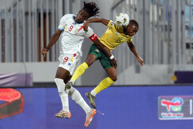 (250513) -- ISMAILIA, May 13, 2025 (Xinhua) -- Lazola Maku (R) of South Africa vies with Samuel Ntanda-Lukisa of DR Congo during the CAF U20 Africa Cup of Nations quarter-final match between South Africa and the Democratic Republic of the Congo (DRC) in Ismailia, Egypt, on May 12, 2025. (Xinhua/Ahmed Gomaa)