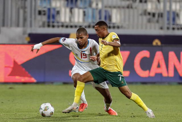 (250513) -- ISMAILIA, May 13, 2025 (Xinhua) -- Shakeel April (R) of South Africa competes during the CAF U20 Africa Cup of Nations quarter-final match between South Africa and the Democratic Republic of the Congo (DRC) in Ismailia, Egypt, on May 12, 2025. (Xinhua/Ahmed Gomaa)