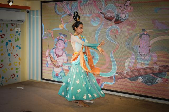 (250530) -- LALITPUR, May 30, 2025 (Xinhua) -- A contestant performs a talent show at the 18th "Chinese Bridge" Chinese proficiency competition for foreign secondary school students in Lalitpur, Nepal, on May 30, 2025. The final rounds of "Chinese Bridge" Chinese proficiency competitions for primary-and secondary-school students in Nepal were held on Friday in Lalitpur, a city in the Kathmandu Valley. (Photo by Hari Maharjan/Xinhua)
