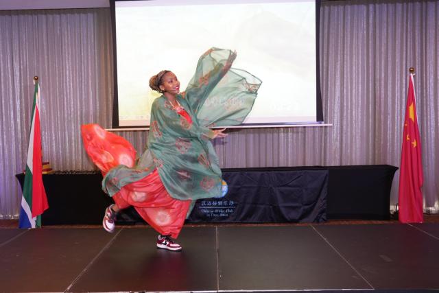 (250530) -- CAPE TOWN, May 30, 2025 (Xinhua) -- A contestant performs a talent show during the South Africa finals of the 24th "Chinese Bridge" Chinese Proficiency Competition for Foreign College Students in Cape Town, South Africa, on May 30, 2025. The South Africa finals of the 24th "Chinese Bridge" Chinese Proficiency Competition for Foreign College Students took place on Friday in Cape Town, the country's legislative capital, where participants showcased remarkable language abilities and cultural talents. (Xinhua/Wang Lei)
