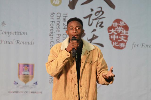 (250531) -- HARARE, May 31, 2025 (Xinhua) -- A student delivers a speech at the "Chinese Bridge" competition at the University of Zimbabwe in Harare, Zimbabwe, May 30, 2025.
  TO GO WITH "Zimbabwean students showcase language skills at Chinese proficiency contest" (Xinhua/Tafara Mugwara)