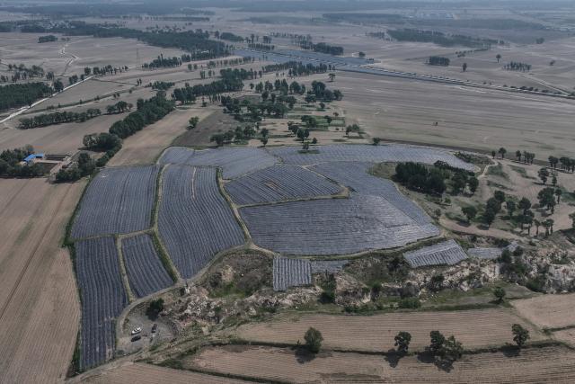 (250601) -- FUXIN, June 1, 2025 (Xinhua) -- An aerial drone photo taken on May 30, 2025 shows a wild jujube plantation project in Wufeng Township of Zhangwu County in Fuxin, northeast China's Liaoning Province. Located on the southern edge of the Horqin sandy land, Zhangwu County was once plagued by sand and dust storms. For more than 70 years, people here have made unremitting efforts in transforming the ecological environment of this area to win the tough battle against desertification. The forest coverage rate of Zhangwu has increased from 2.9 percent to more than 30 percent, while the number of dusty days per year has fallen to single digits.
   In recent years, Zhangwu County has promoted its ecological and industrial transformation, and increased local income by developing forestry and under-forest economy. (Xinhua/Pan Yulong)