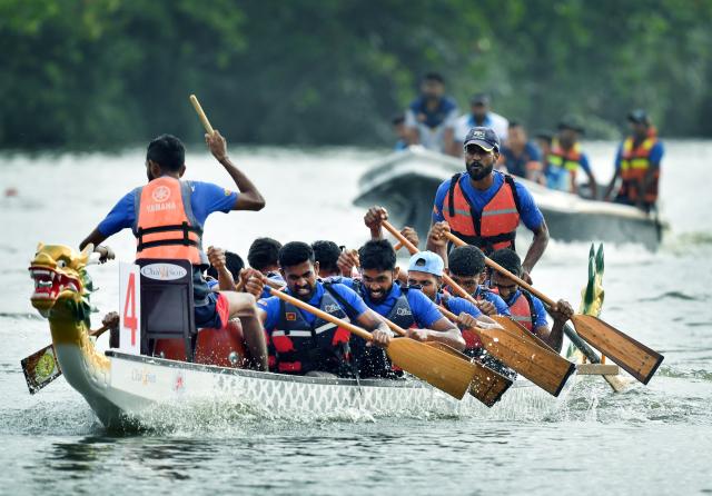 (250601) -- KOTTE, June 1, 2025 (Xinhua) -- People take part in the 2025 Dragon Boat Festival China-Sri Lanka Friendship Cup Dragon Boat Championship in Kotte, Sri Lanka, on May 31, 2025. In a gesture of sports diplomacy and cultural exchange, the Chinese Embassy in Sri Lanka has donated five 12-person international-standard dragon boats to Sri Lanka's Ministry of Youth Affairs and Sports.
   The donation was formally made on Saturday at the 2025 Dragon Boat Festival China-Sri Lanka Friendship Cup Dragon Boat Championship.
  TO GO WITH "China donates 5 int'l-standard dragon boats to Sri Lanka" (Photo by Ajith Perera/Xinhua)