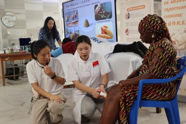 (250601) -- DAKAR, June 1, 2025 (Xinhua) -- This photo taken on May 23, 2025 shows a Traditional Chinese Medicine (TCM) training program held by the 20th batch of the Chinese medical team to Senegal at the Fann National University Hospital Center in Dakar, the capital of Senegal. The 20th batch of the Chinese medical team to Senegal has lately launched a Traditional Chinese Medicine (TCM) training program, which enrolled over 30 local health workers and medical students. (The 20th batch of the Chinese medical team to Senegal/Handout via Xinhua)