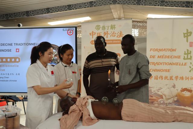 (250601) -- DAKAR, June 1, 2025 (Xinhua) -- This photo taken on May 23, 2025 shows a Traditional Chinese Medicine (TCM) training program held by the 20th batch of the Chinese medical team to Senegal at the Fann National University Hospital Center in Dakar, the capital of Senegal. The 20th batch of the Chinese medical team to Senegal has lately launched a Traditional Chinese Medicine (TCM) training program, which enrolled over 30 local health workers and medical students. (The 20th batch of the Chinese medical team to Senegal/Handout via Xinhua)