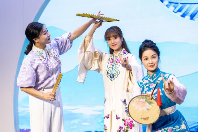 (250605) -- CHENZHOU, June 5, 2025 (Xinhua) -- Actress Liu Jie (L) instructs young actresses during a rehearsal at a small theater of the Hunan Kunqu Opera Troupe in Beihu District of Chenzhou City in central China's Hunan Province, June 3, 2025.
  The centuries-old Kunqu Opera has been listed by the United Nations Educational, Scientific and Cultural Organization (UNESCO) as an intangible cultural heritage. In recent years, the Hunan Kunqu Opera Troupe managed to cultivate a good number of outstanding young actors through professional training programs and community outreach campaigns, bringing this olden art into the attention and affection of a growing base of youngsters. (Xinhua/Chen Sihan)