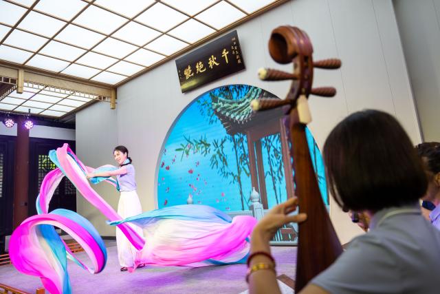 (250605) -- CHENZHOU, June 5, 2025 (Xinhua) -- Actress Cao Jingxia practices long sleeve maneuver skill at a small theater of the Hunan Kunqu Opera Troupe in Beihu District of Chenzhou City in central China's Hunan Province, June 4, 2025.
  The centuries-old Kunqu Opera has been listed by the United Nations Educational, Scientific and Cultural Organization (UNESCO) as an intangible cultural heritage. In recent years, the Hunan Kunqu Opera Troupe managed to cultivate a good number of outstanding young actors through professional training programs and community outreach campaigns, bringing this olden art into the attention and affection of a growing base of youngsters. (Xinhua/Chen Sihan)