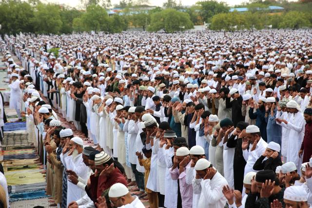 (250607) -- BHOPAL, June 7, 2025 (Xinhua) -- People offer Eid al-Adha prayers in Bhopal, the capital city of India's Madhya Pradesh state, June 7, 2025. (Str/Xinhua)