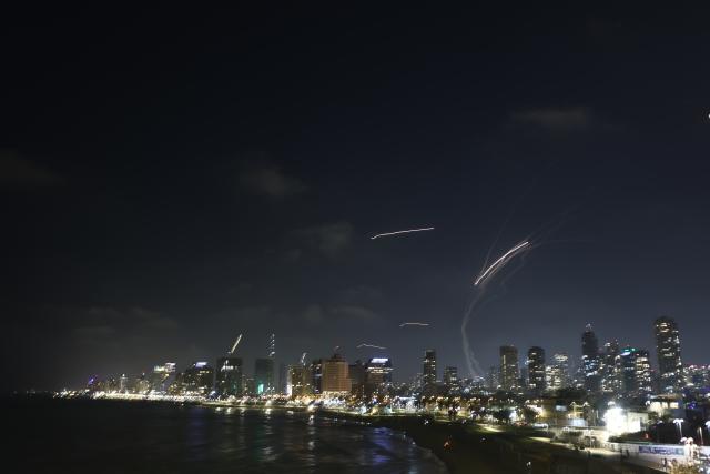 (250613) -- TEL AVIV, June 13, 2025 (Xinhua) -- Israeli air defense system fires to intercept missiles over Tel Aviv, Israel, on June 13, 2025. Dozens of missiles were fired from Iran into Israel on Friday evening, according to statements issued by the Israel Defense Forces (IDF). (Photo by Jamal Awad/Xinhua)