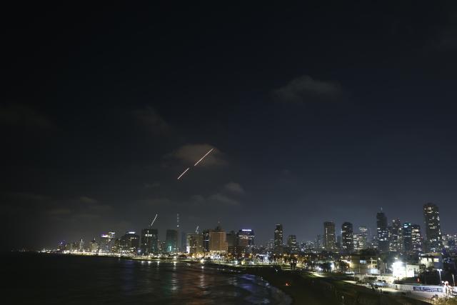 (250613) -- TEL AVIV, June 13, 2025 (Xinhua) -- Israeli air defense system fires to intercept missiles over Tel Aviv, Israel, on June 13, 2025. Dozens of missiles were fired from Iran into Israel on Friday evening, according to statements issued by the Israel Defense Forces (IDF). (Photo by Jamal Awad/Xinhua)