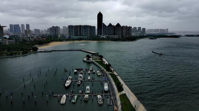 (250614) -- GUANGZHOU, June 14, 2025 (Xinhua) -- An aerial drone photo taken on June 14, 2025 shows boats berthing in Zhanjiang City, south China's Guangdong Province. Typhoon Wutip, the first typhoon of this year, made its second landfall near Leizhou City in south China's Guangdong Province at around 12:30 a.m. Saturday, according to the provincial meteorological observatory. (Xinhua/Xiao Ennan)